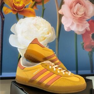 adidas Originals Gazelle Indoor sneakers in mustard and orange